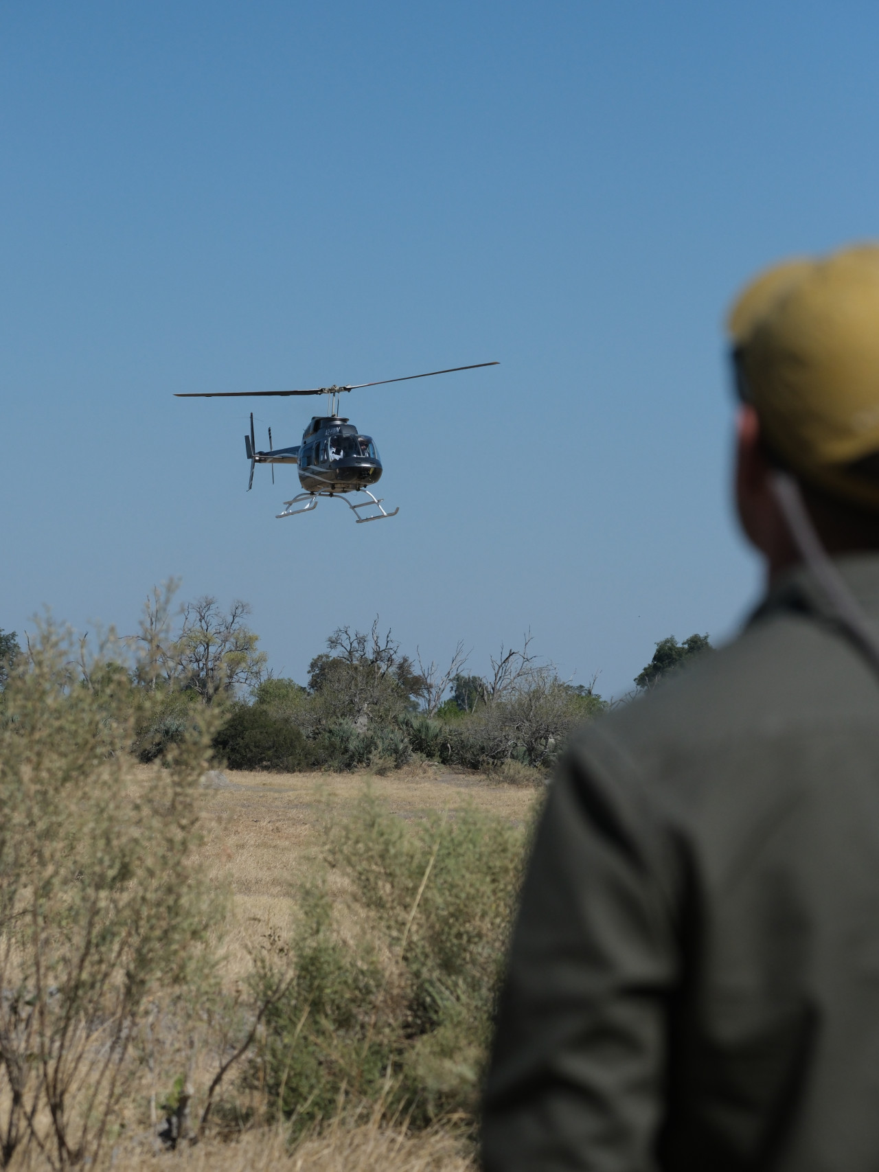 Transfer mit Helikopter während Safari in Botswana