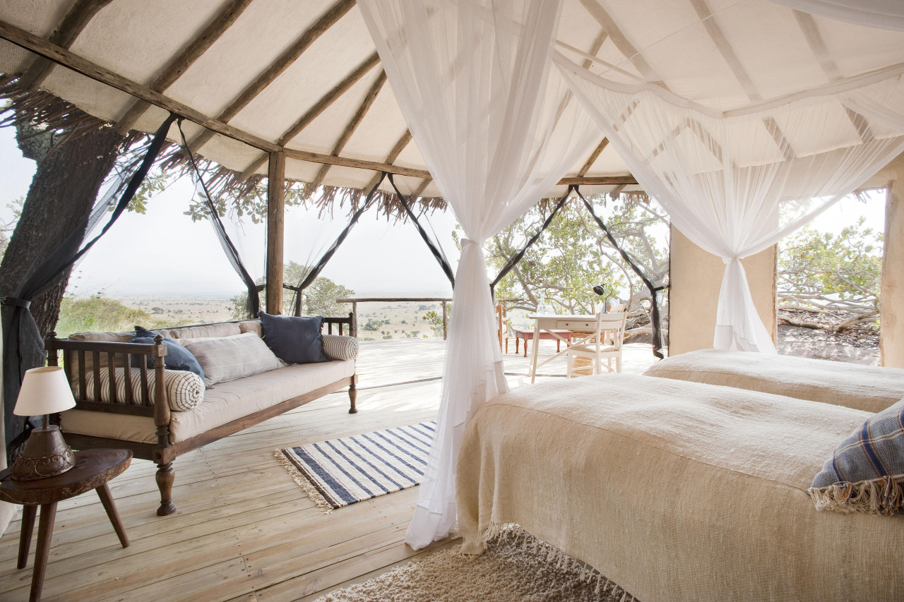 Schlafzimmer mit offener privater Veranda